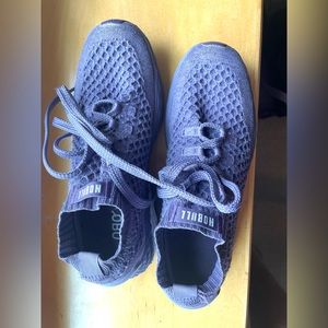 NOBULL knit runners light purple in color